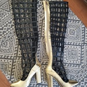 Thigh high caged boots
